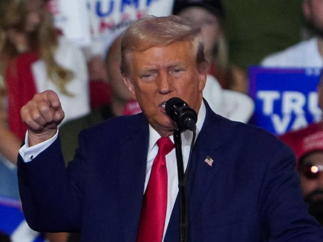 republican presidential nominee and former us president donald trump gestures as he speaks during a campaign rally in wilkes barre pennsylvania us on august 17 2024 photo reuters